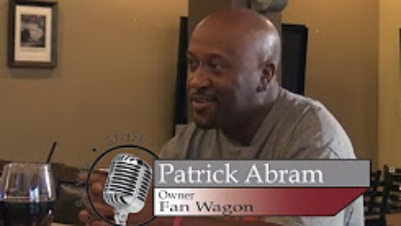 Ron Stark sits with Patrick Abram Owner of Fan Wagon